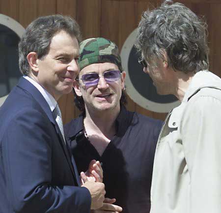 With Britain's Tony Blair